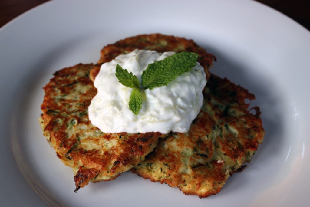 fried Greek zucchini fritters with tzatziki sauce
